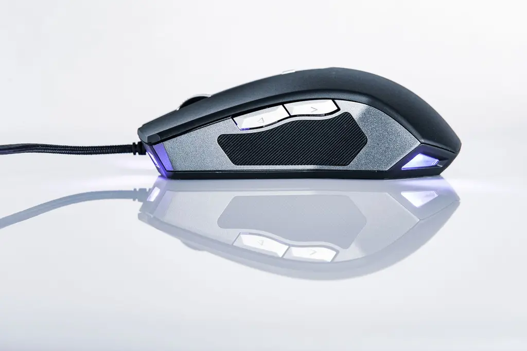 Side view of a wired gaming mouse with a grid of thumb buttons