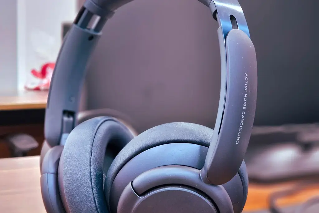 Close-up of over-ear wireless headphones with soft padded ear cups